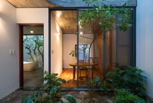 V1 House in Vinh: A 4-Story Townhouse Blending Open Architecture and Heritage - image 0