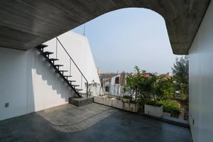 V1 House in Vinh: A 4-Story Townhouse Blending Open Architecture and Heritage - image 10