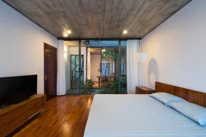 V1 House in Vinh: A 4-Story Townhouse Blending Open Architecture and Heritage - image 29