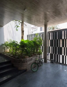 V1 House in Vinh: A 4-Story Townhouse Blending Open Architecture and Heritage - image 7