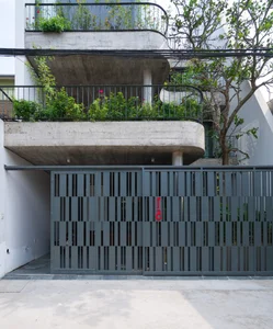 V1 House in Vinh: A 4-Story Townhouse Blending Open Architecture and Heritage - image 25