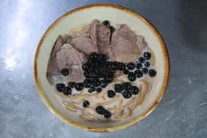 Exploring the Controversial Milk Tea Beef Noodles Trend in Hanoi - image 3