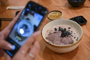 Exploring the Controversial Milk Tea Beef Noodles Trend in Hanoi - image 6