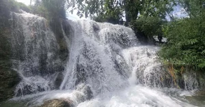 Escaping the Heat: Discover the Serene Beauty of Thac May Waterfall - image 1
