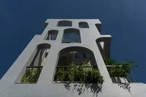 A Hanoi house in a narrow alley filled with natural light and ventilation - image 12