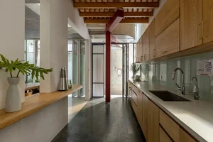 A Hanoi house in a narrow alley filled with natural light and ventilation - image 7