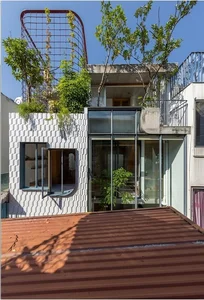 A Hanoi house in a narrow alley filled with natural light and ventilation - image 3