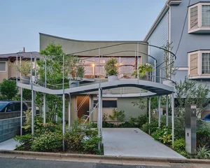 Modern Japanese Architecture: Kazari Garden House in Tokyo Featuring a Unique Curved Terrace and Light-Filled Minimalist Split-Level Interiors - image 8