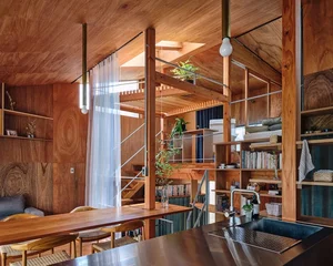 Modern Japanese Architecture: Kazari Garden House in Tokyo Featuring a Unique Curved Terrace and Light-Filled Minimalist Split-Level Interiors - image 2