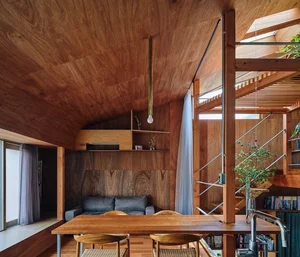 Modern Japanese Architecture: Kazari Garden House in Tokyo Featuring a Unique Curved Terrace and Light-Filled Minimalist Split-Level Interiors - image 4