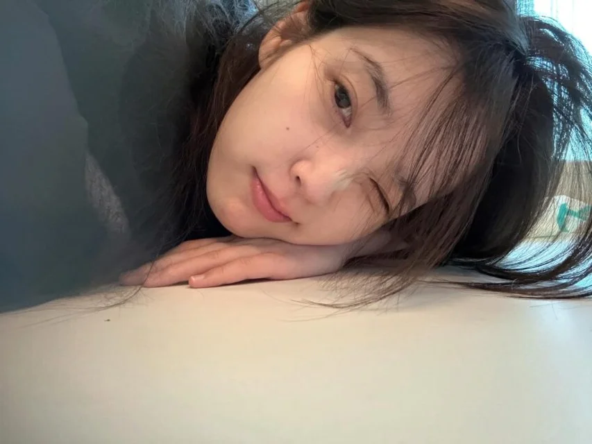 Korean Star IU Stuns Fans with Viral No-Makeup Photos: Discover Her Timeless Beauty and Skincare Secrets in Her Thirties