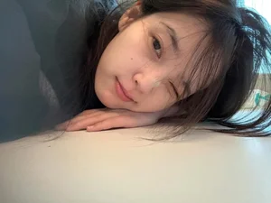 Korean Star IU Stuns Fans with Viral No-Makeup Photos: Discover Her Timeless Beauty and Skincare Secrets in Her Thirties - image 0