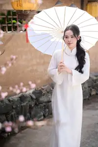 Elegant White Ao Dai: Pure Beauty of Vietnamese Woman with Pristine Orchids. - image 16