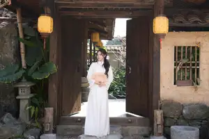 Elegant White Ao Dai: Pure Beauty of Vietnamese Woman with Pristine Orchids. - image 7