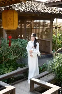 Elegant White Ao Dai: Pure Beauty of Vietnamese Woman with Pristine Orchids. - image 14