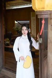 Elegant White Ao Dai: Pure Beauty of Vietnamese Woman with Pristine Orchids. - image 2