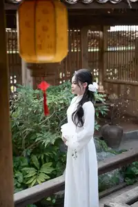 Elegant White Ao Dai: Pure Beauty of Vietnamese Woman with Pristine Orchids. - image 9