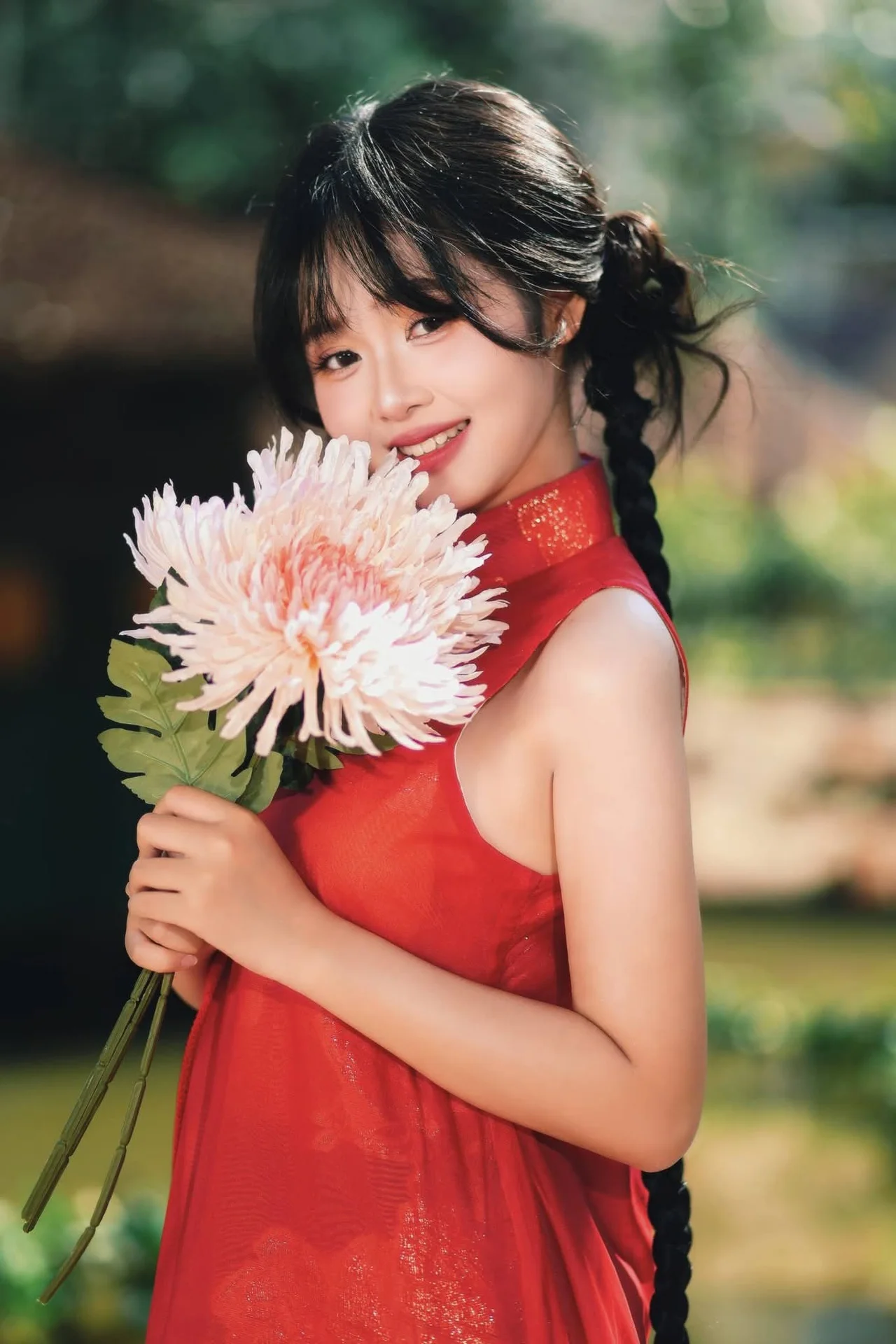 Captivating Vietnamese Beauty: Graceful Girl in Traditional Red Ao Dai