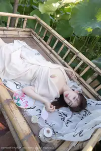Discover Lu Xuan Xuan's Graceful Beauty in a White Dress Amidst a Serene Lotus Pond - XiuRen No.10630 - image 3