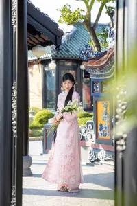Graceful Asian Lady in Pink Ao Dai with Pristine White Lilies in Traditional Setting - image 8