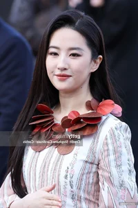 Liu Yifei Stuns in Dramatic Emerald Green Gown and Luxury High Jewelry: Red Carpet Fashion Inspiration and Global Celebrity Style Trends - image 1