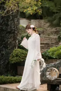 Elegant Asian Beauty: A Gentle Girl Adorned with a Pure White Orchid - image 14