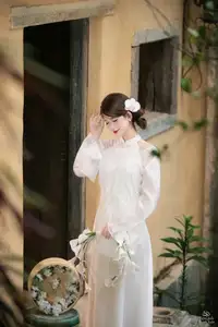 Elegant Asian Beauty: A Gentle Girl Adorned with a Pure White Orchid - image 3