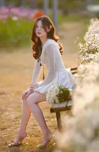 Gentle Muse in White Daisy Field: Youthful Beauty Captivating Hearts Under Golden Hour Sun - image 15