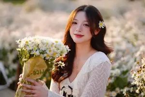 Gentle Muse in White Daisy Field: Youthful Beauty Captivating Hearts Under Golden Hour Sun - image 14
