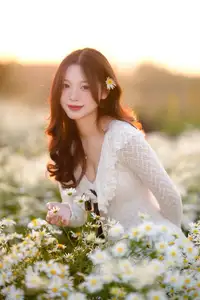 Gentle Muse in White Daisy Field: Youthful Beauty Captivating Hearts Under Golden Hour Sun - image 2