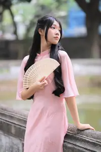 Embracing Vietnamese Grace: Pink Ao Dai Beauty at an Ancient Temple - image 4