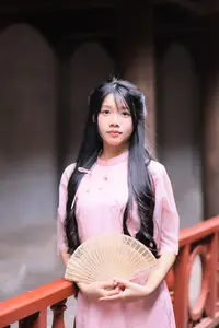 Embracing Vietnamese Grace: Pink Ao Dai Beauty at an Ancient Temple - image 2