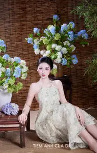 Ethereal Vietnamese Beauty: Graceful Asian Girl in Modern Yếm with Delicate Blooms. - image 3
