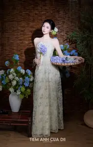 Ethereal Vietnamese Beauty: Graceful Asian Girl in Modern Yếm with Delicate Blooms. - image 0