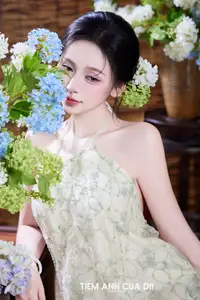 Ethereal Vietnamese Beauty: Graceful Asian Girl in Modern Yếm with Delicate Blooms. - image 11