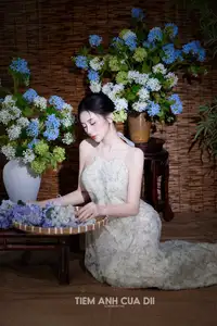 Ethereal Vietnamese Beauty: Graceful Asian Girl in Modern Yếm with Delicate Blooms. - image 6