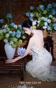 Ethereal Vietnamese Beauty: Graceful Asian Girl in Modern Yếm with Delicate Blooms. - image 8