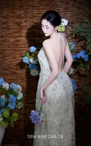 Ethereal Vietnamese Beauty: Graceful Asian Girl in Modern Yếm with Delicate Blooms. - image 2