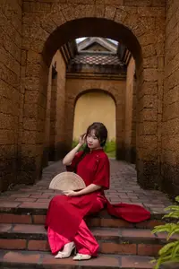 Discover the Timeless Elegance of a Vietnamese Woman in Red Ao Dai at Ancient Architecture. - image 6
