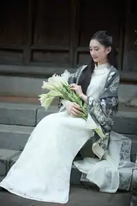 Graceful Vietnamese Woman in Ao Dai Amidst Ancient Architecture - image 8