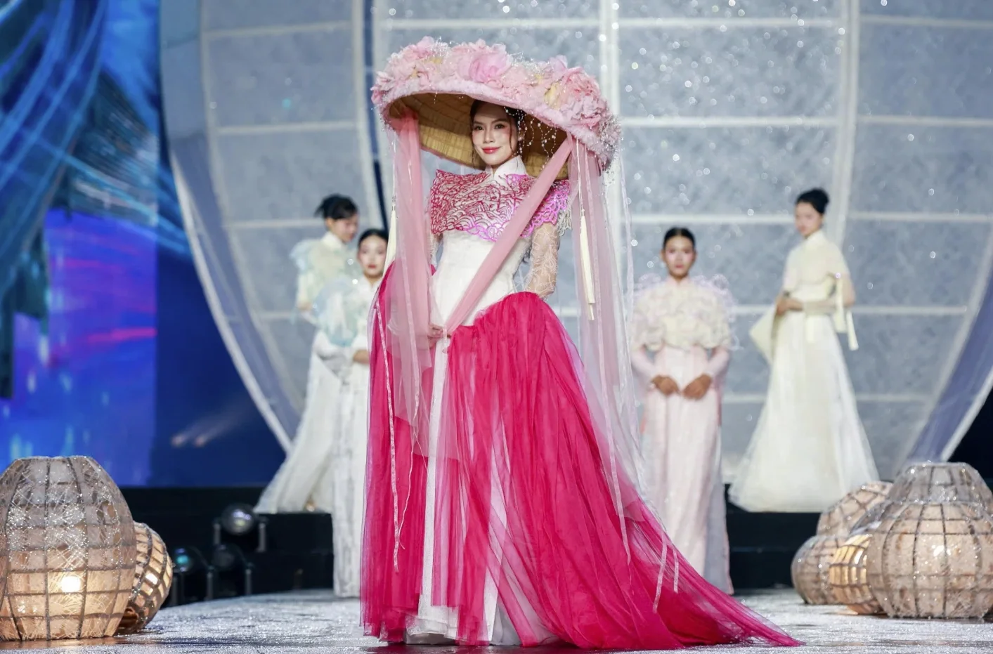 Miss Universe Stars Shine on Nguyen Hue Street with Data Network Inspired Fashion