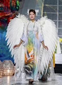 Miss Universe Stars Shine on Nguyen Hue Street with Data Network Inspired Fashion - image 2