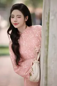 Discover Asian Beauty: Elegant Girl in Dreamy Pink Ao Dai Portrait - image 7