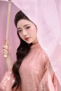 Discover Asian Beauty: Elegant Girl in Dreamy Pink Ao Dai Portrait - image 11