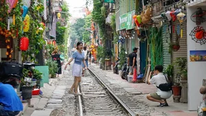 The Allure and Danger of Hanoi Train Street: Why Tourists Still Flock to the Tracks - image 11