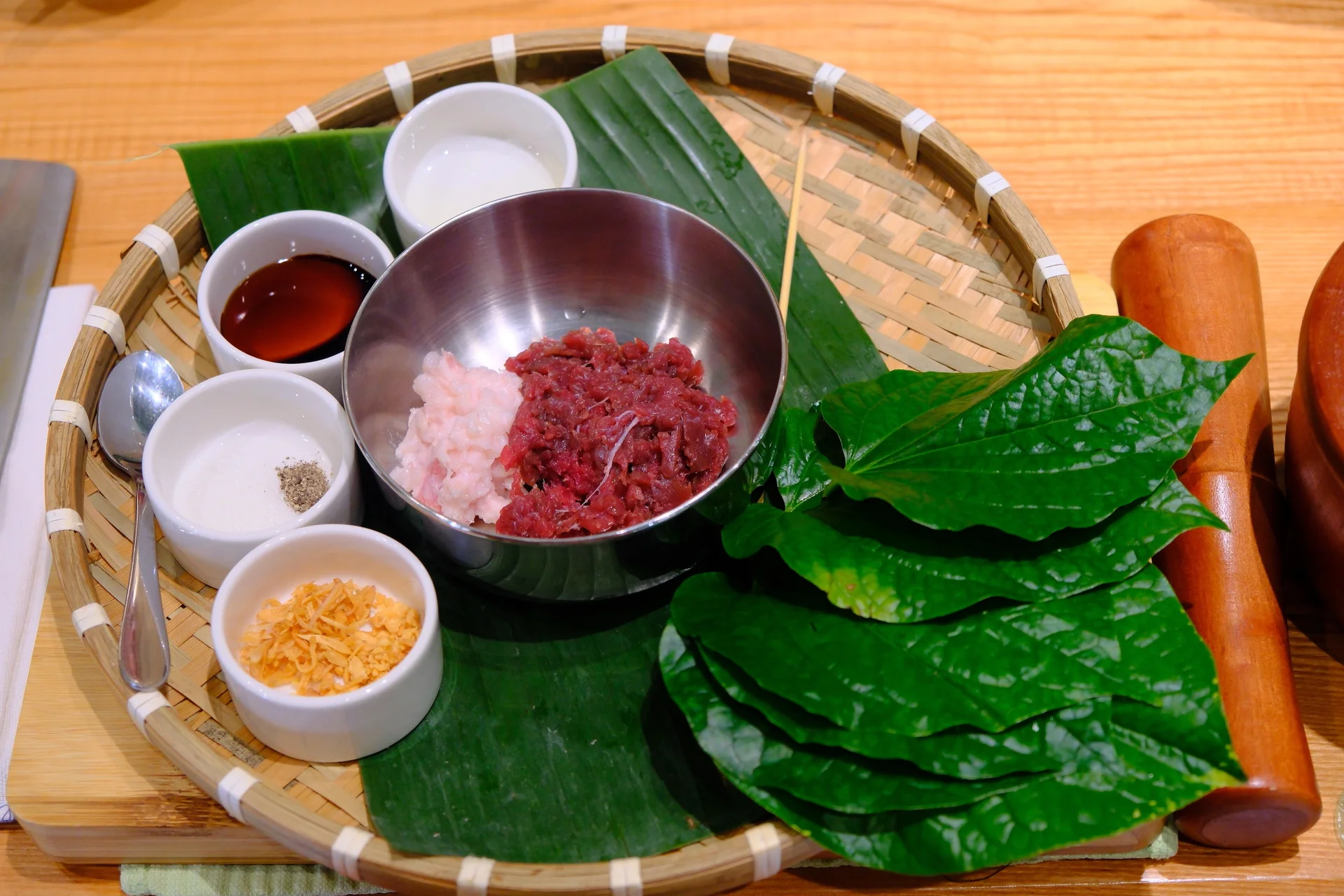 Foreign Tourists Master the Art of Making Banh Xeo and Bo La Lot in Saigon