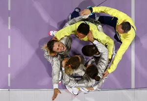 Iconic Gold Medal Celebrations and Unforgettable Victory Moments at the Paris 2024 Olympic Games - image 5