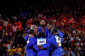 Iconic Gold Medal Celebrations and Unforgettable Victory Moments at the Paris 2024 Olympic Games - image 12