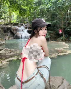 Breathtaking Nature Photoshoot: Bold Fashion Meets the Serenity of the Stream - image 0