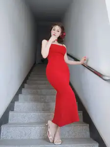 Stunning Coser Baiyin in a Red Dress: Elegant Allure on the Staircase [Fantia] - image 5